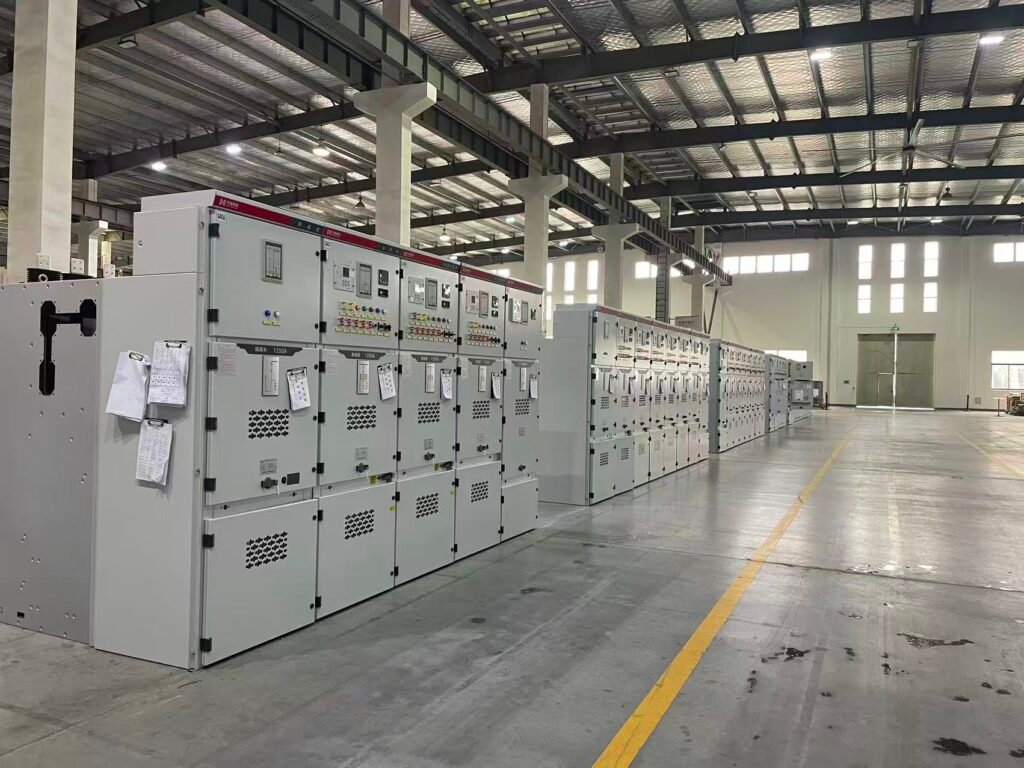 Medium-voltage switchgear panels arranged in a manufacturing workshop