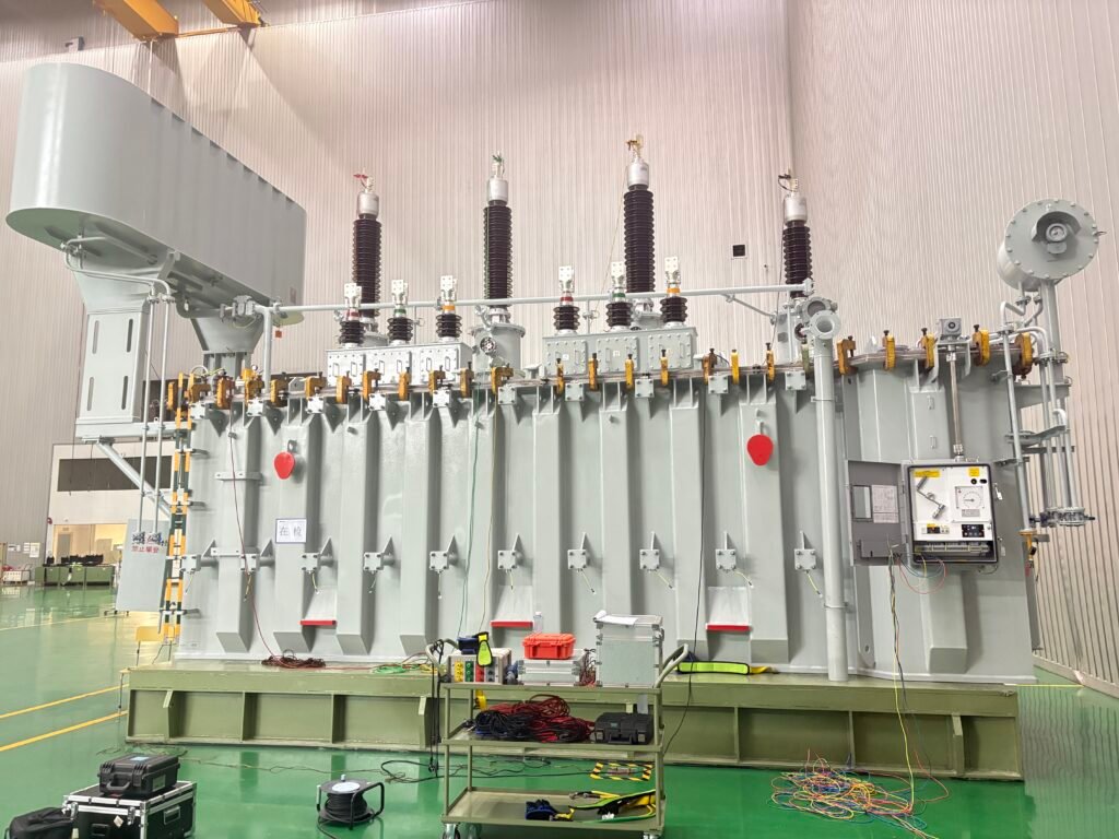 Power Transformer Power transformer undergoing inspection in a manufacturing workshop